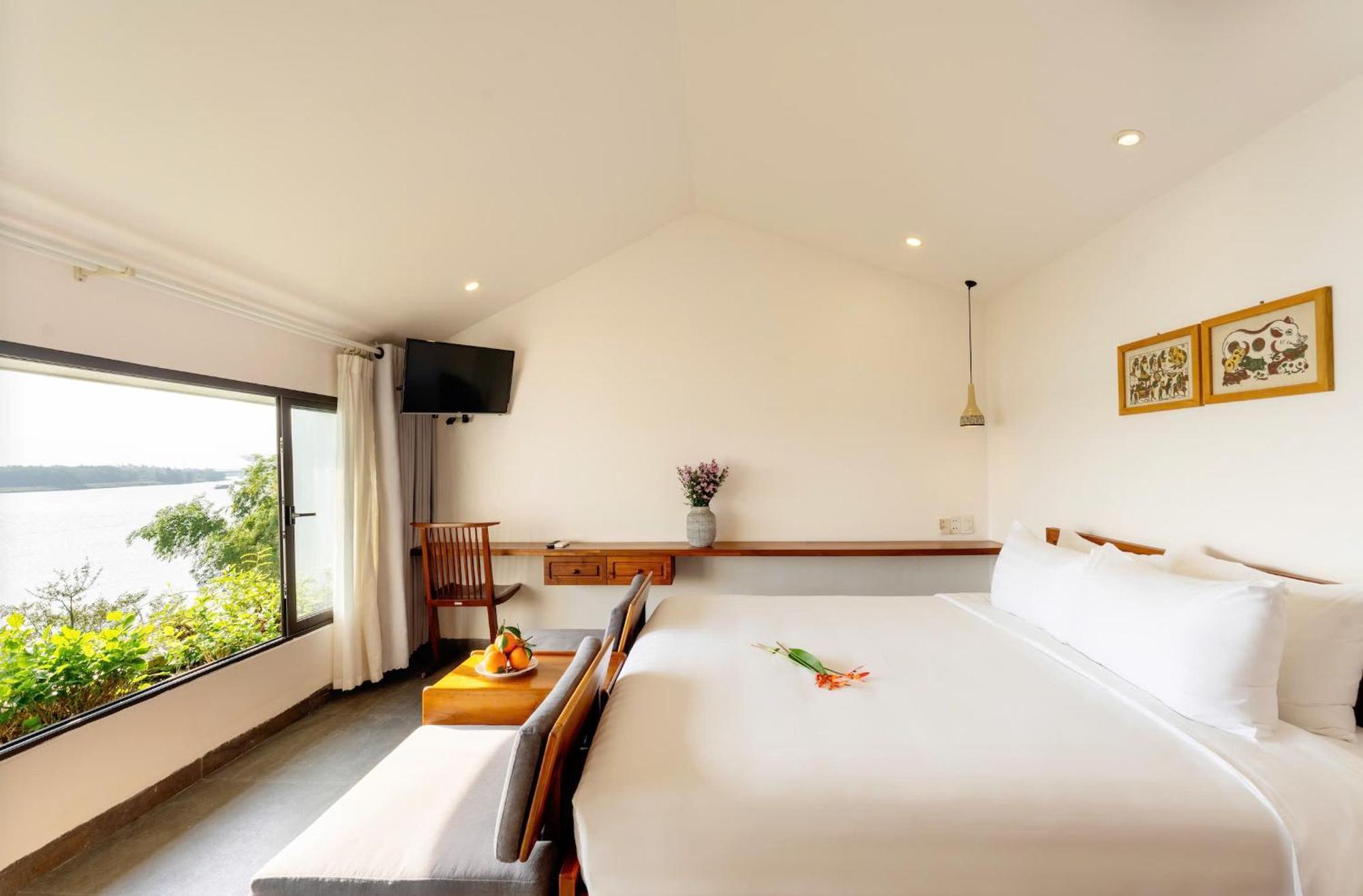 Serene Riverside Hotel Hoi An Bagian luar foto